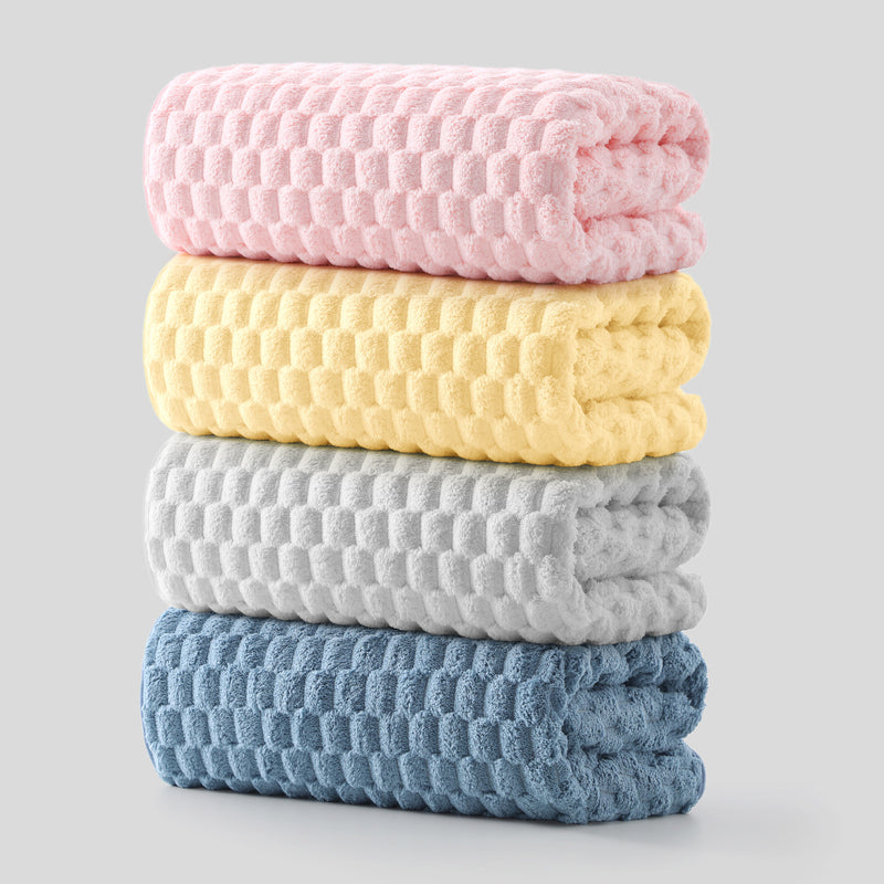 Soft waffle-textured microfiber bath towel set with four color-coded towels for family bathrooms